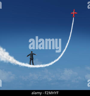 Follow your dreams concept and motivational symbol as a businessman walking upward on a smoke trail created by a jet airplane as an icon for dreaming and aspiring for growth success. Stock Photo