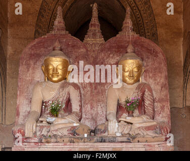 Gautama and Maitreya twin Buddha statues at 12th century Dhammayangyi Pagoda, Bagan, Myanmar Stock Photo