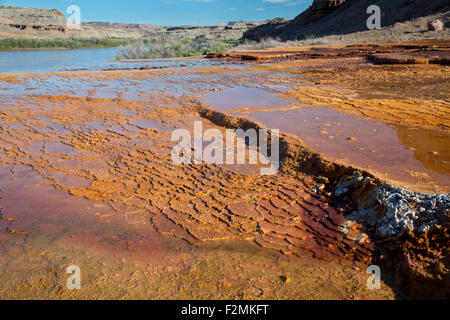 Green River, Utah - Travertine terraces formed by Crystal Geyser, a cold water geyser on the banks of the Colorado River. Stock Photo