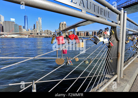 Love locks under the Brooklyn Bridge on the Brooklyn side New York City Stock Photo