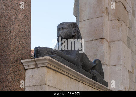 Black granite Egyptian sphinx statue at the Diocletian's Palace in Split, Croatia. Stock Photo