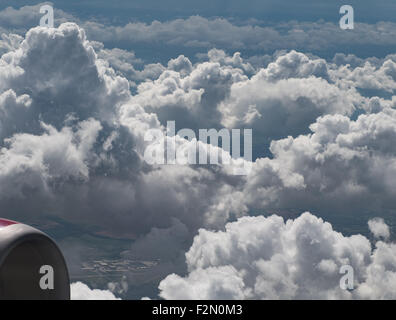 Clouds viewed from above. Taken through an aircraft window. Stock Photo