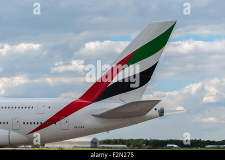 MANCHESTER, UNITED KINGDOM - AUG 07, 2015: Emirates Airbus A380 tail livery at Manchester Airport Aug 07 2015. Stock Photo