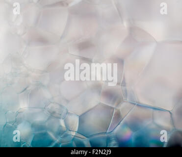 Dreamy hazy abstract background - soap suds macro in blue Stock Photo