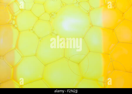 Abstract background with hexagonal geometric shapes. Soap suds extreme closeup. Stock Photo