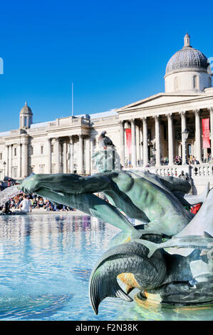 Pigeon sitting on the head of a statue in Trafalgar Square, London, England, UK Stock Photo