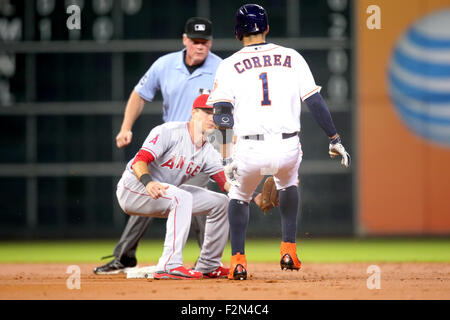 Houston, TX, USA. 21st Sep, 2015. Houston Astros shortstop Carlos Correa #1 is tagged out by Los Angeles Angels infielder Taylor Featherston #8 during the MLB baseball game between the Houston Astros and the Los Angeles Angels from Minute Maid Park in Houston, TX. Credit image: Erik Williams/Cal Sport Media/Alamy Live News Stock Photo