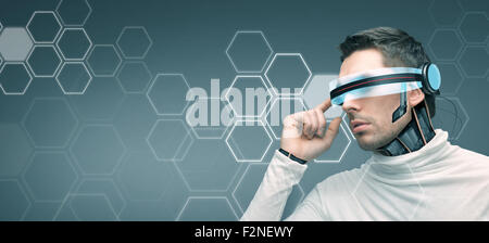 man with futuristic 3d glasses and sensors Stock Photo