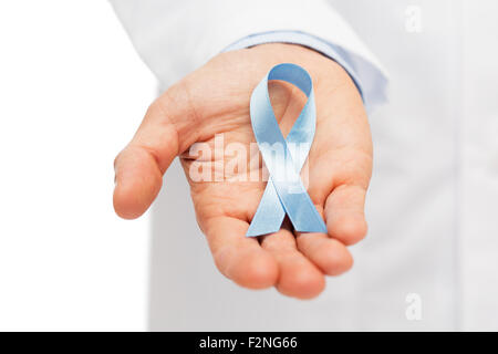 doctor hand with prostate cancer awareness ribbon Stock Photo