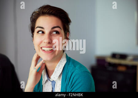 Close up of smiling woman looking up Stock Photo