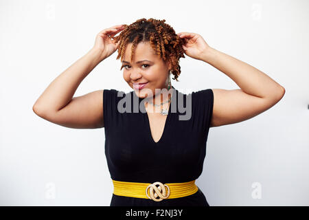 Stylish woman posing in dress Stock Photo