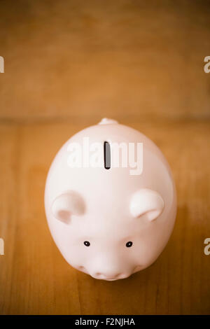 Close up of piggy bank on table Stock Photo