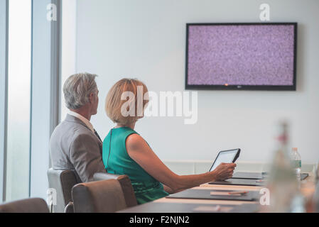 Caucasian business people in videoconference meeting Stock Photo