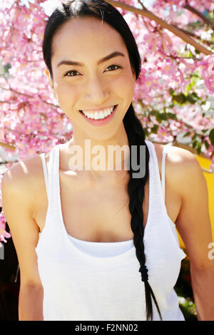 Spring blossoming tree. Happy spring day. Girl enjoy sakura bloom in ...