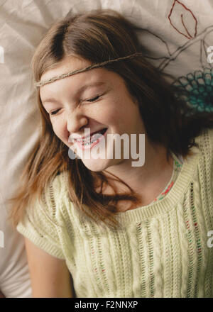 Caucasian girl with braces wearing braid headband Stock Photo