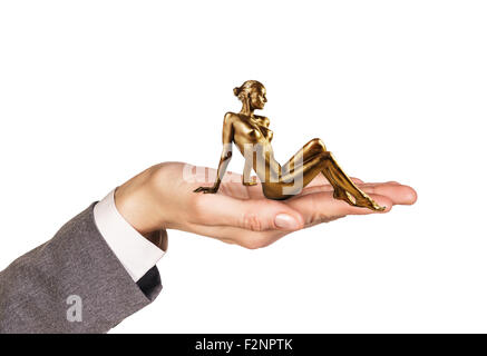 Open palm holds woman with gold skin Stock Photo