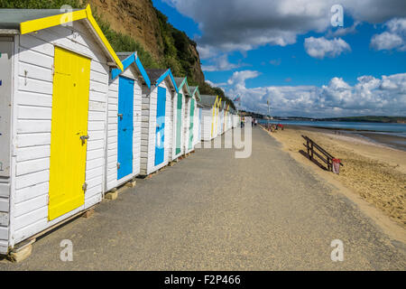 Multi-Coloured beach Chalets in a line on the sea front at Shanklin Isle Of Wight. Stock Photo