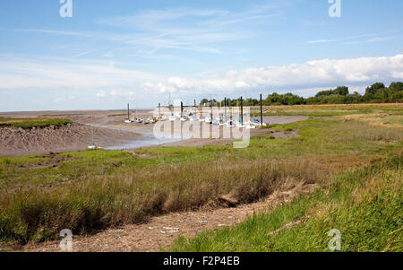 the marina in Burnham on sea with boats moored during low tide Stock Photo