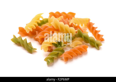 Raw colorful italian fusilli pasta isolated on white Stock Photo