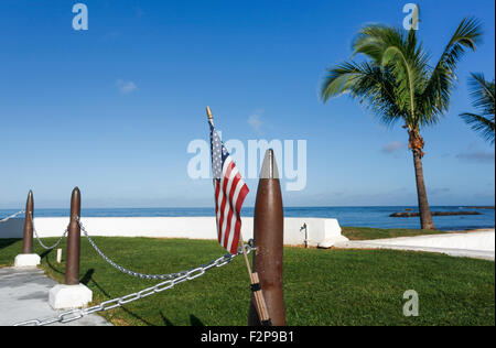 Hawaii, USA. 16th Sept, 2015. The United States of America flag with an artillery shell against a blue sky in Hawaii. Stock Photo