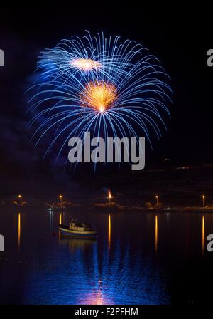 Blue colors amazing fireworks in Malta with the dark sky background Stock Photo