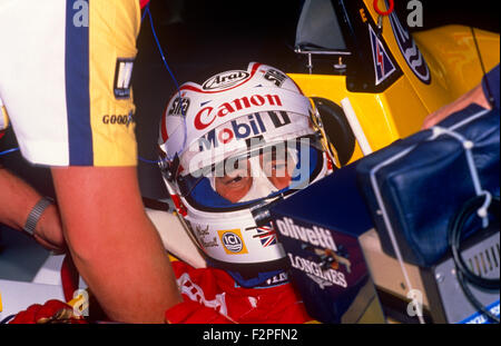 Nigel Mansell sitting in the cockpit of his Williams Honda Formula 1 car 1987 Stock Photo