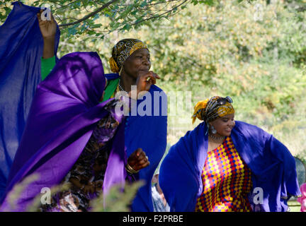 Somali Bantu woman dancing at harvest festival celebration, New Gloucester Maine Stock Photo
