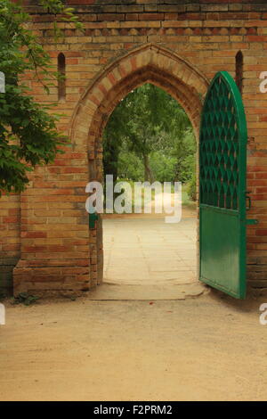 entrance door to the park in the green trees Stock Photo