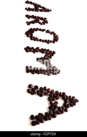 laid out on a white background the word aroma of coffee beans Stock Photo