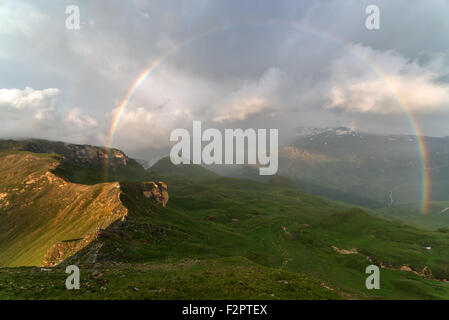 Amazing rainbow on the top of grossglockner pass, Alps, Switzerland, Europe. Stock Photo