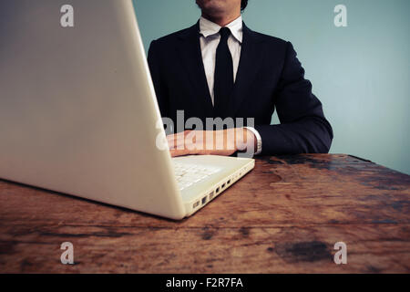 Businessman using a laptop Stock Photo