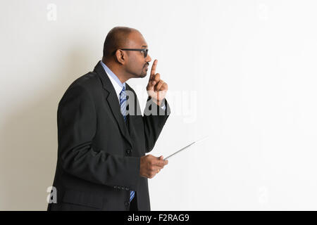 indian business man with stop and silent sign Stock Photo