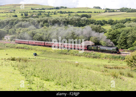 A preserved steam train on the East Lancs Railway, at Irwell Vale, near Bury in Lancashire Stock Photo