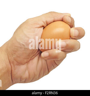 egg in male hand isolated on white background Stock Photo