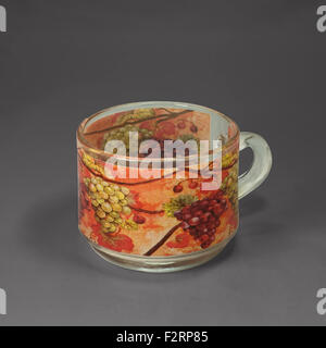 Small round glass cup with fruit painting Stock Photo