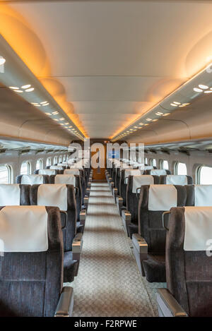 The immaculate interior of an empty Green Class carriage on a Tokaido line Shinkansen bullet train in Japan Stock Photo