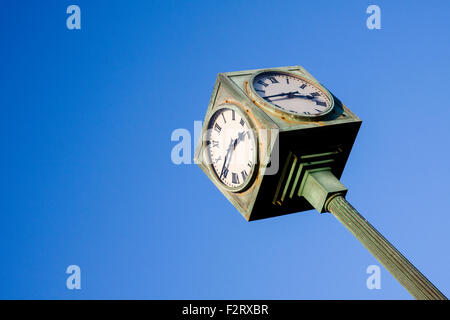 Old clock at 3.45pm against a blue sky on the seafront at St Leonards on Sea, Hastings, East Sussex, England, UK Stock Photo