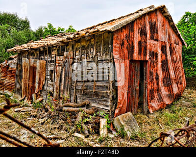 Rusty sheets of corrugated iron in different colors. Texture background of  brown, gray, yellow, green corrugated fence. Colorful galvanized sheet.  Background image of corrugated metal sheets 4542924 Stock Photo at Vecteezy