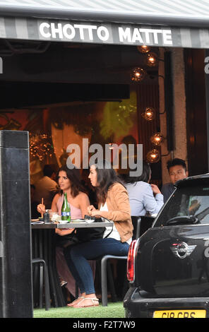 Lucy Mecklenburgh seen chopping down on some Japanese Foods after spending a whole day promoting fitness workouts at JD Sports in London. The Tv Reality Star was seen chomping down some food with her chop sticks as she dined out.  Featuring: Lucy Mecklenburgh Where: London, United Kingdom When: 22 Jul 2015 Stock Photo