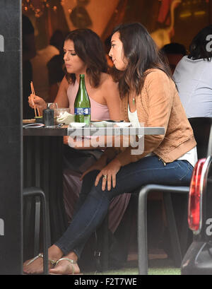 Lucy Mecklenburgh seen chopping down on some Japanese Foods after spending a whole day promoting fitness workouts at JD Sports in London. The Tv Reality Star was seen chomping down some food with her chop sticks as she dined out.  Featuring: Lucy Mecklenburgh Where: London, United Kingdom When: 22 Jul 2015 Stock Photo