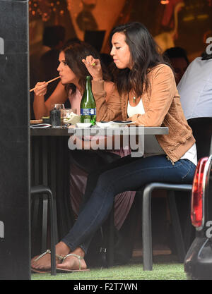 Lucy Mecklenburgh seen chopping down on some Japanese Foods after spending a whole day promoting fitness workouts at JD Sports in London. The Tv Reality Star was seen chomping down some food with her chop sticks as she dined out.  Featuring: Lucy Mecklenburgh Where: London, United Kingdom When: 22 Jul 2015 Stock Photo
