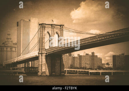 Brooklyn Bridge in New York City with vintage texture effect Stock Photo