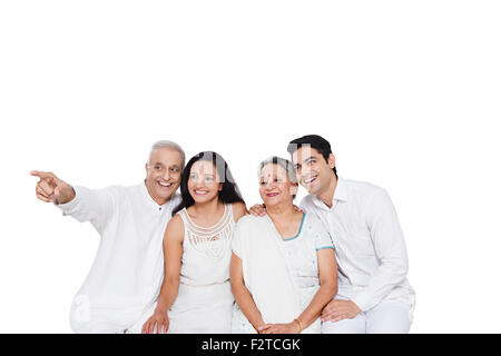 4 indian Adult Only Parents son and Daughter-In-Law finger Pointing Stock Photo