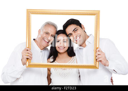 3 indian Parents and son with  Daughter Frame showing Stock Photo