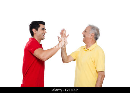 2 indian Father and son hand Clapping Stock Photo