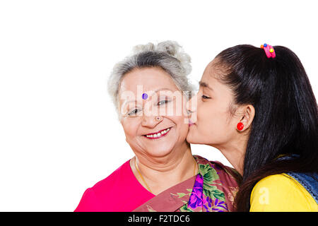 2 indian Grandmother and Granddaughter love Kissing Stock Photo