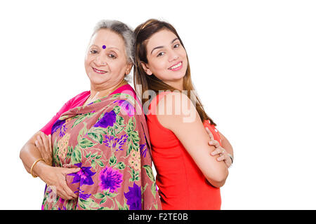 2 indian mother and dayghter Back To Back standing pose Stock Photo