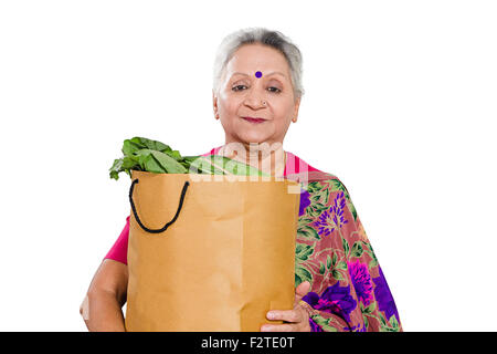 1 indian Senior Adult Woman Vegetable bag Shopping Stock Photo