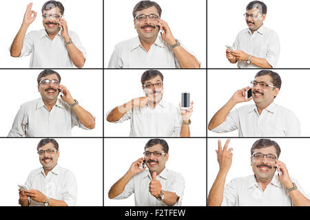 1 indian Adult Man Comparison Mobile Phone Talking Multi Tasking Stock Photo