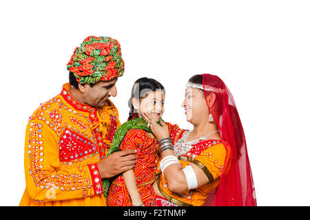 3 indian Rajasthani Villager Parents and daughter Caring Stock Photo